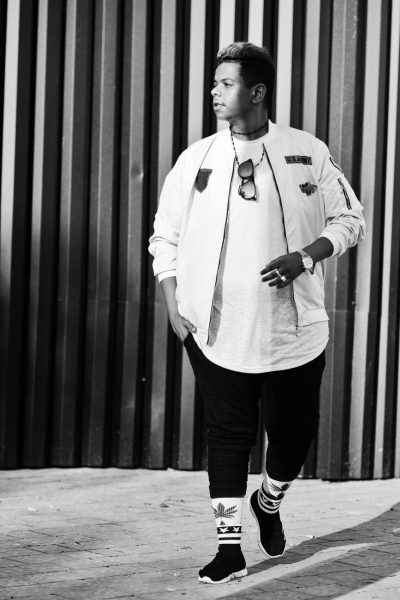 Stylish hipster arab man guy posed outdoor in street. Style rap Stylish hipster arab man guy posed outdoor in street. Style rap singer.